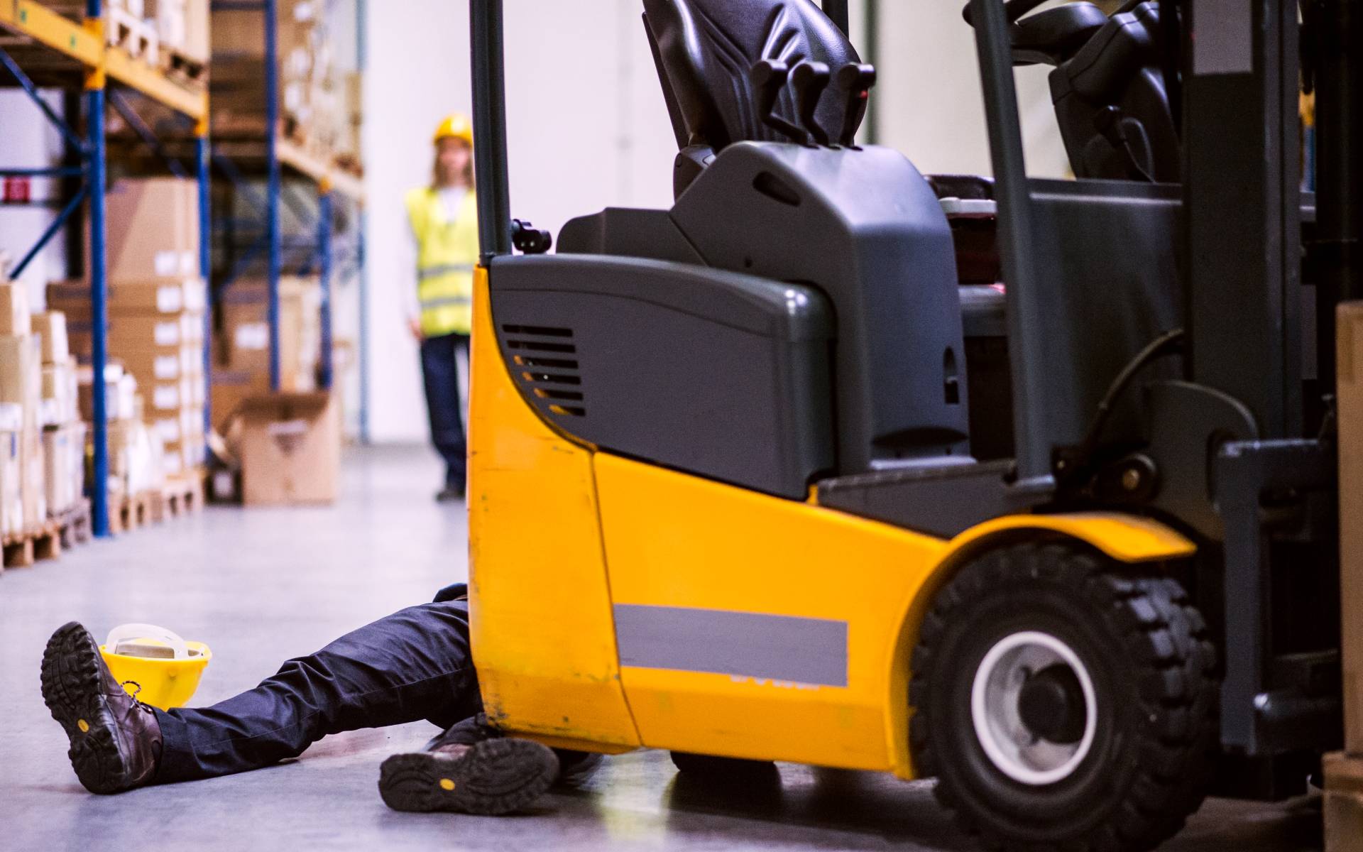 Man unconscious on floor after being hit with forklift at work